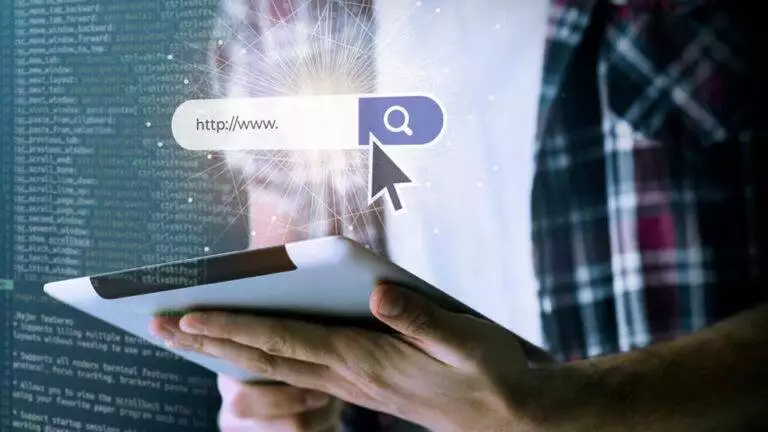 man using a tablet with a digital concept of internet search depicted by an illustrated search bar and cursor, showcasing the best online marketing tools.